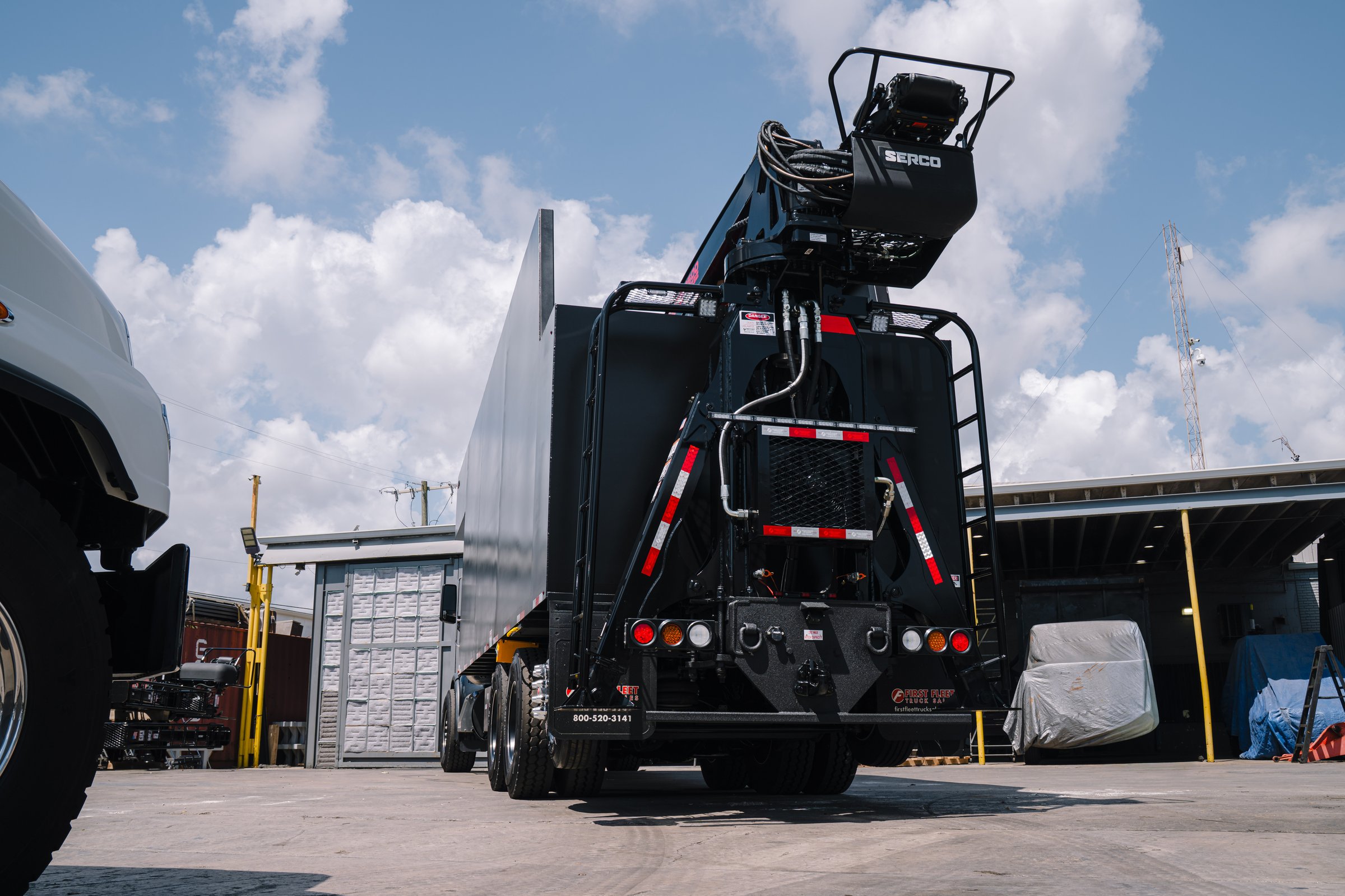 SERCO 8500SR32 loader rear view on a 2026 Peterbilt 567 grapple truck at First Fleet Truck Sales