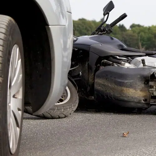 Motorcycle on ground after being involved in a motorcycle accident