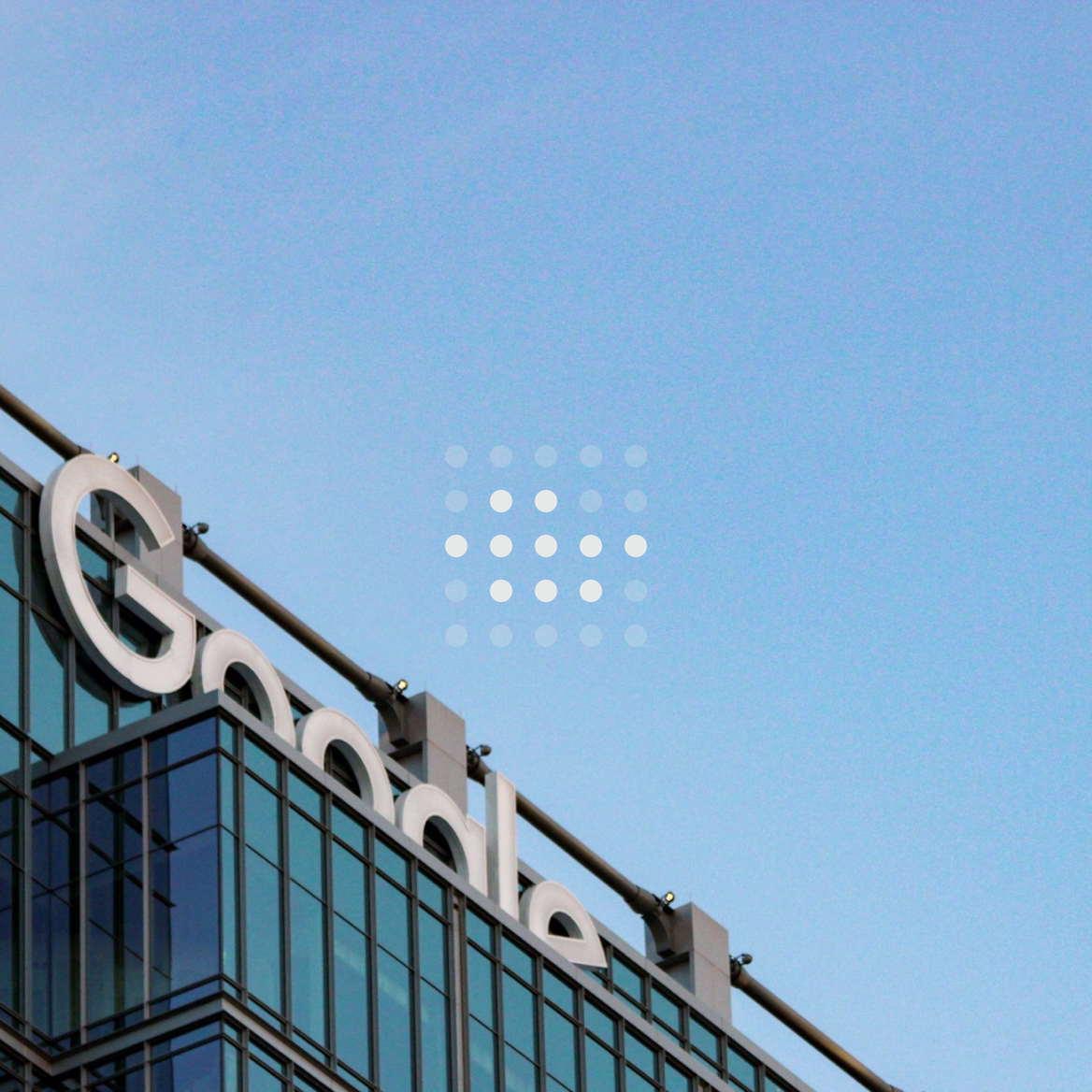 A view of the top of a building with the Google logo