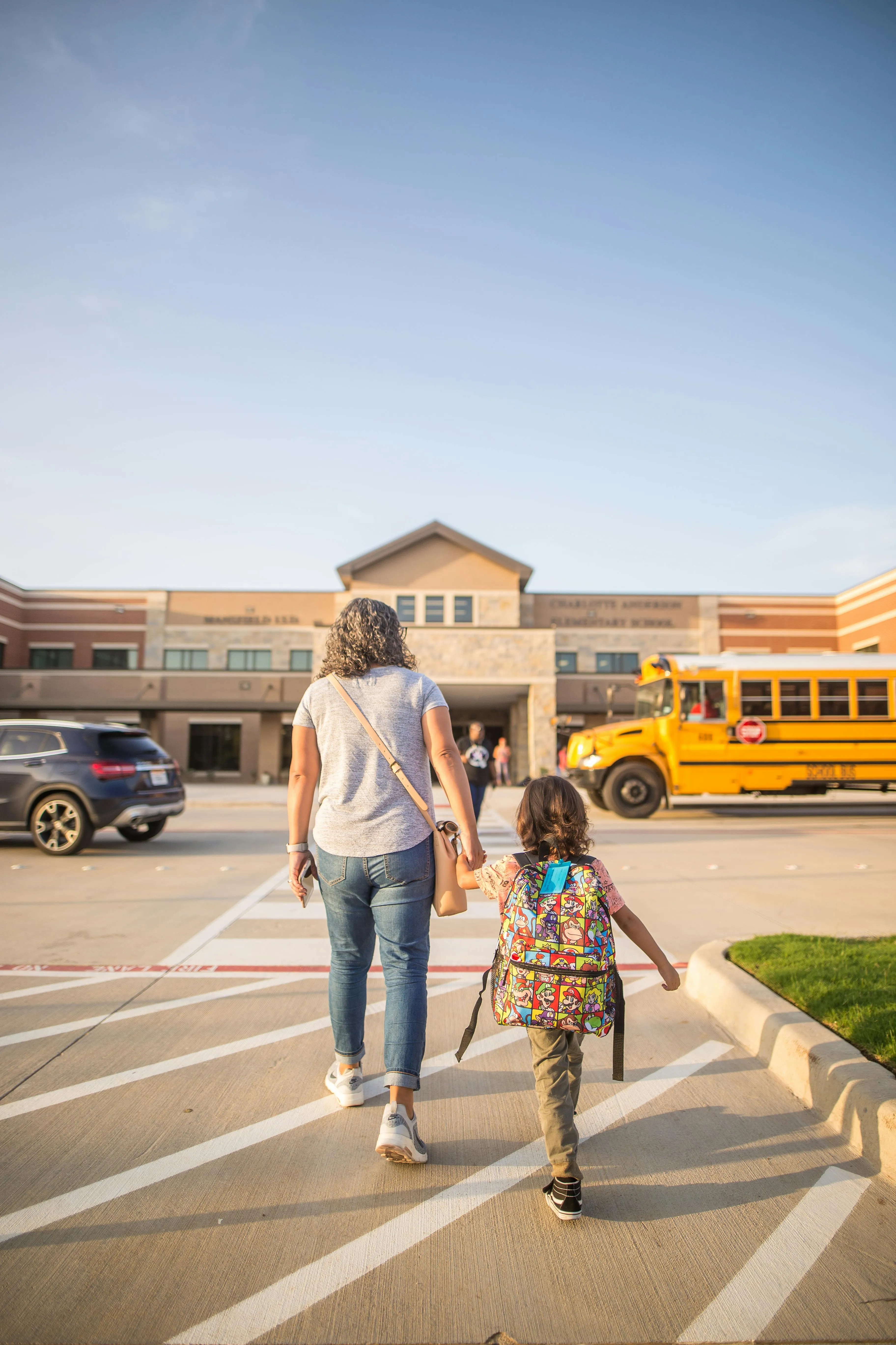 family walking to school stock image