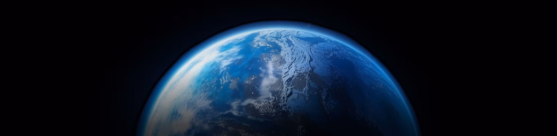 View of Earth from space showing a blue and white curved horizon against a dark background.