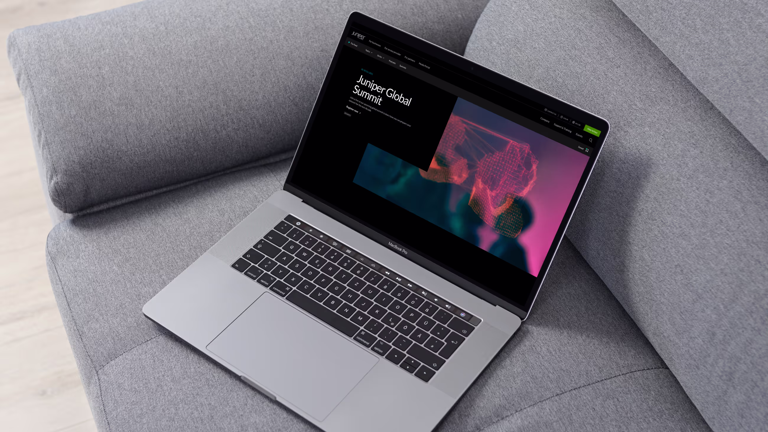 A view of the Juniper Networks website on a laptop