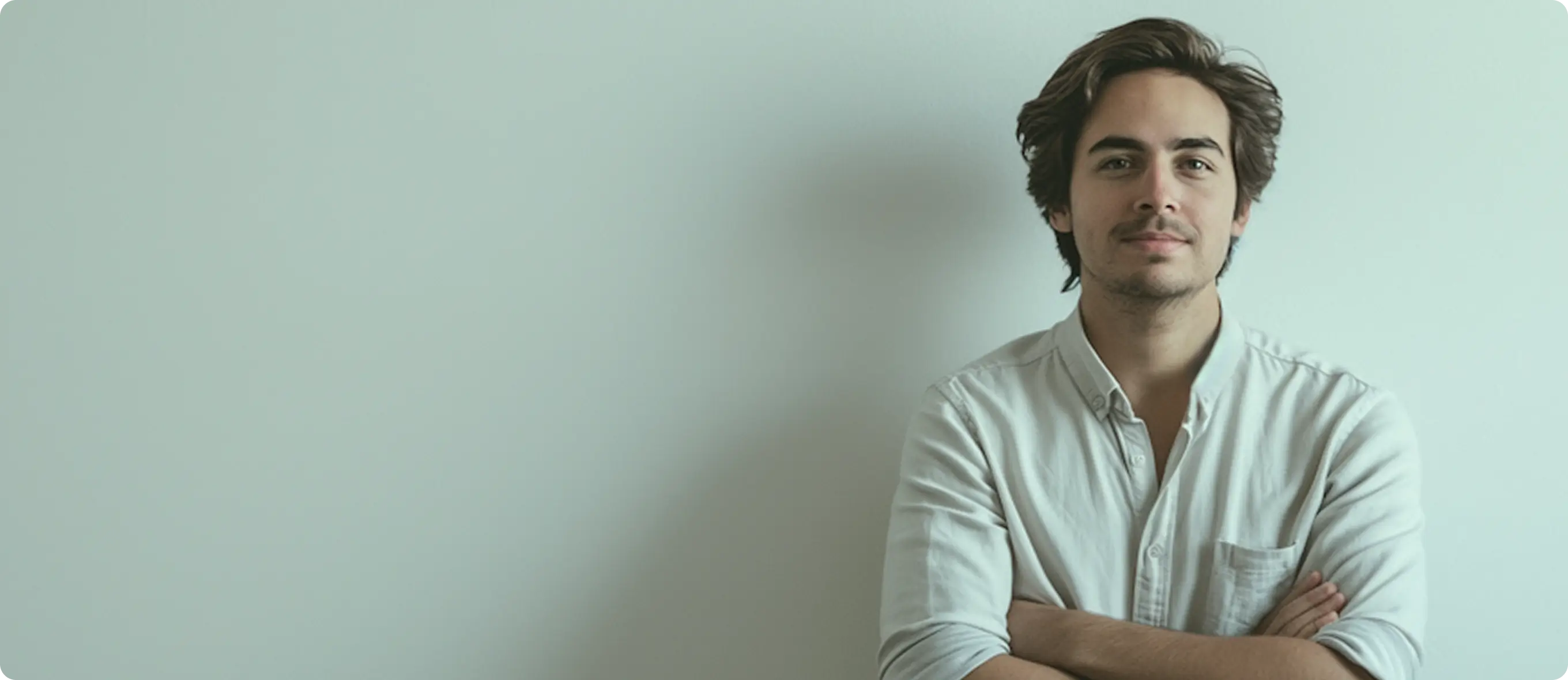 Website homepage for ErgoNext product development featuring navigation links, blurred abstract background, project overview, and objectives text.