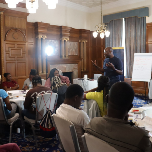 Webpage titled 'From Idea to Reality: The Product Development Explained' with sections on Ideation and Market Research under soft pastel abstract image.