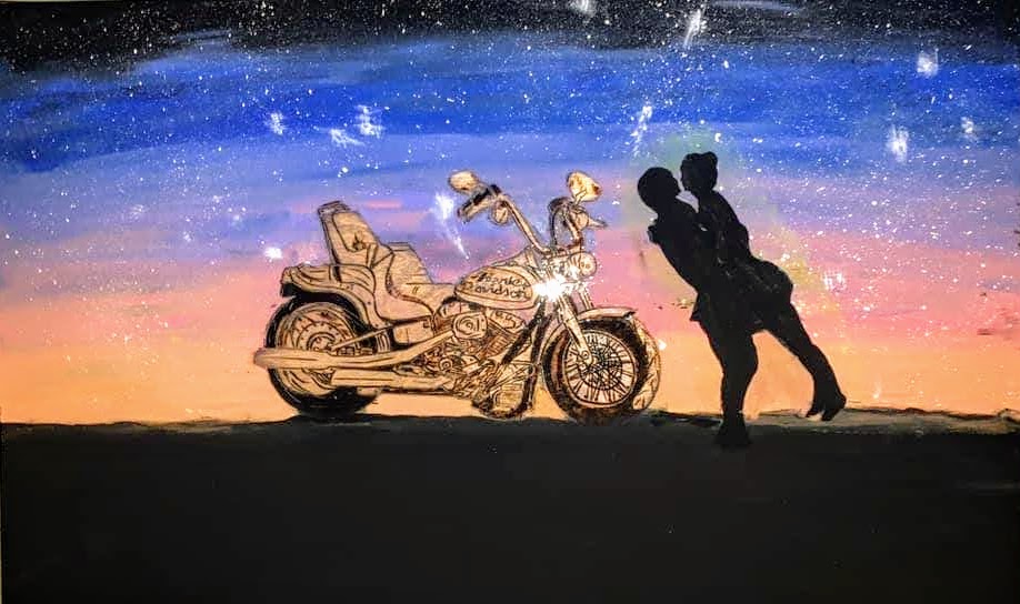 Silhouette of couple embracing beside vintage motorcycle under a starry twilight sky.