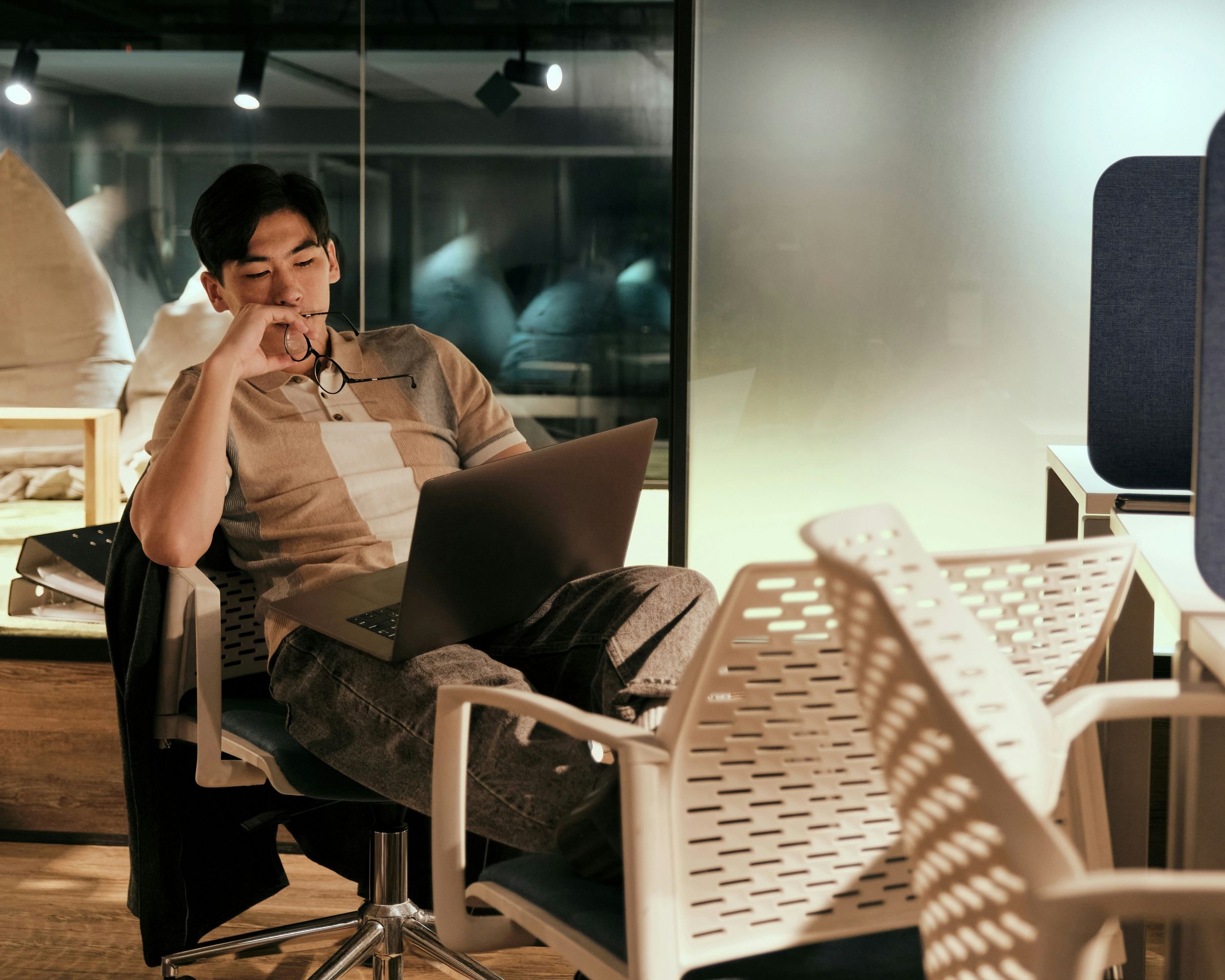 Professional experiencing workplace stress and cognitive fatigue while working at a desk