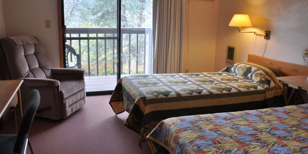 A guest room with a balcony