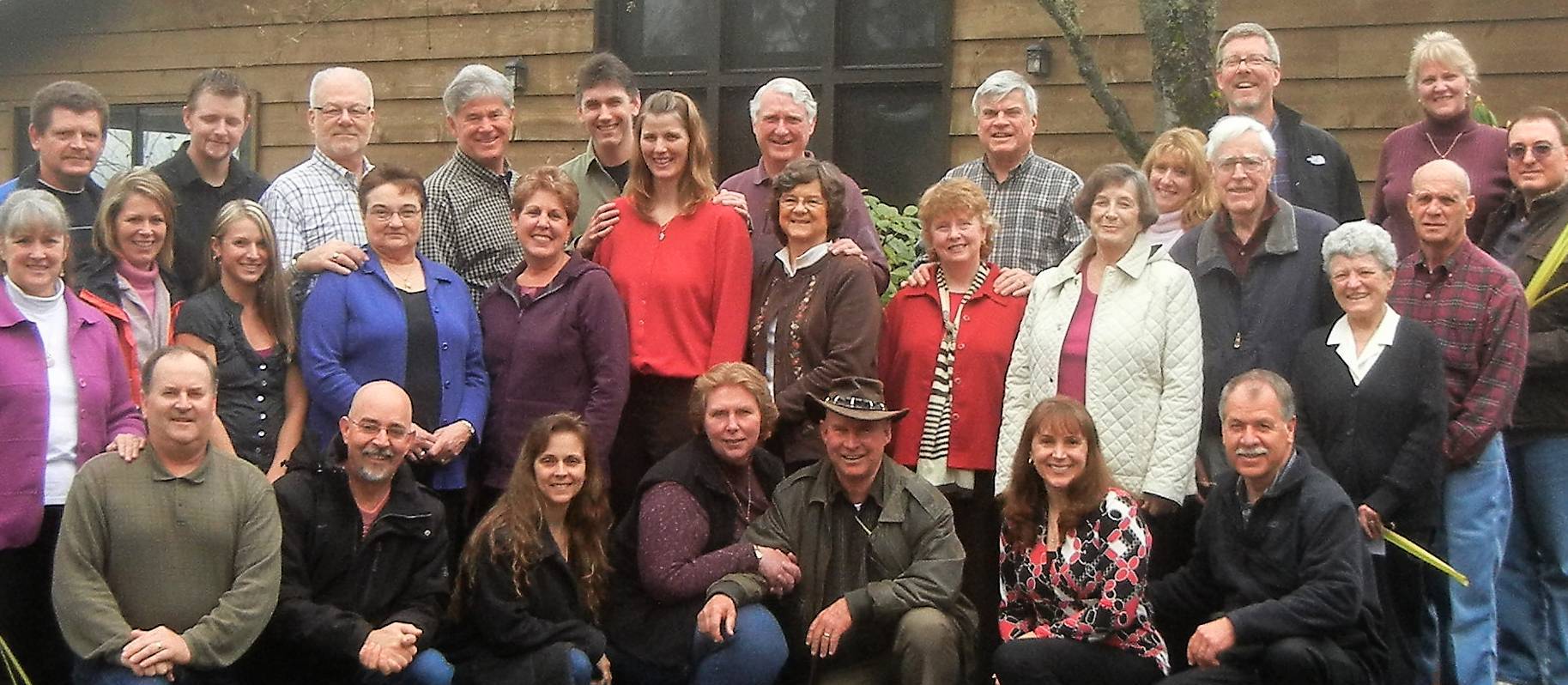A group retreat photo in front of the Friary