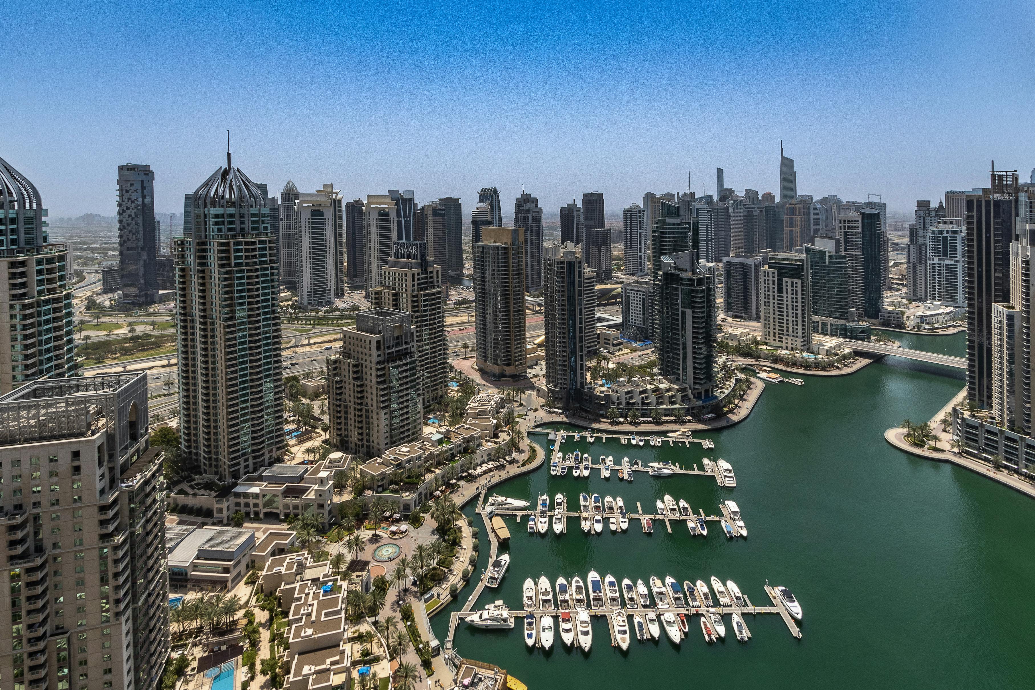 Dubai Marina skyline with waterfront and yachts