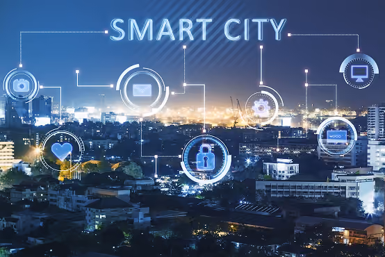 Night cityscape with digital icons showing smart city technology connections and systems.