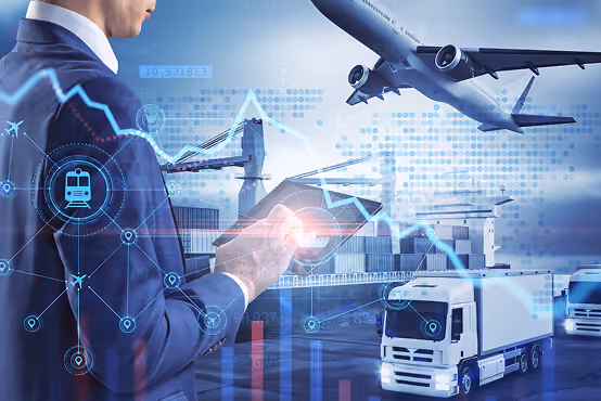 Businessman using tablet with transport icons, airplane, truck, and shipping yard in background.