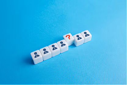 White blocks with person icons in a row and a block with a red question mark in the center on blue background.