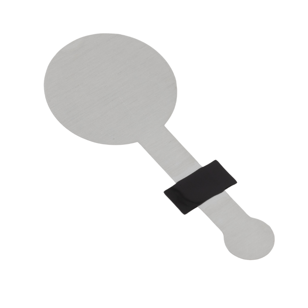 Flat circular stainless steel paddle with a long handle and a black rectangular grip in the middle.