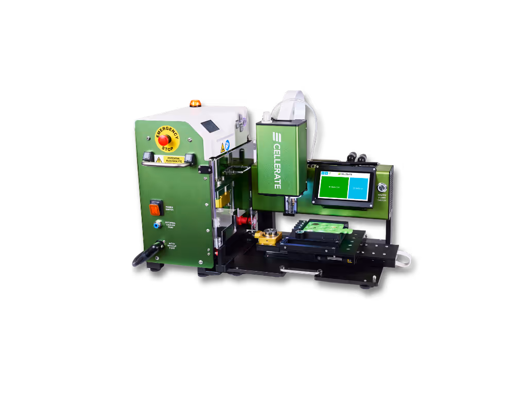 Green and white industrial Cellerate machine with emergency stop button, touchscreen interface, and robotic arm for assembly or sealing tasks.