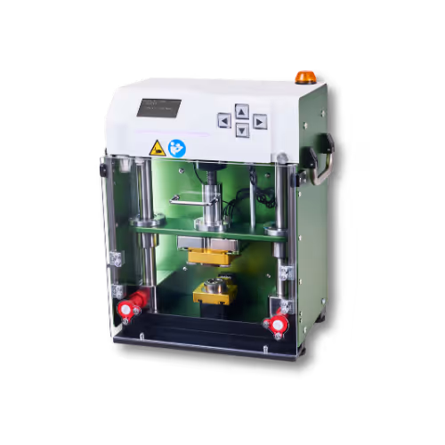 Industrial testing machine with digital controls and a green interior.
