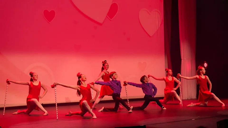 image of volunteer teaching children