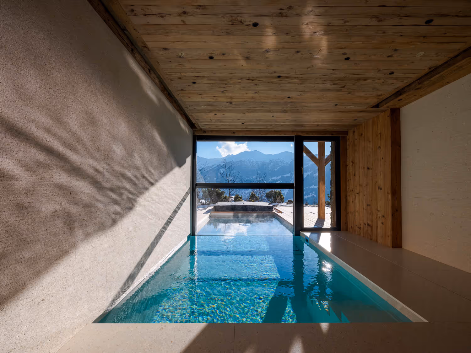 © Samuel Devantéry | Photo Architecturale d'une piscine de LUX intérieur à Verbier en Valais Wallis