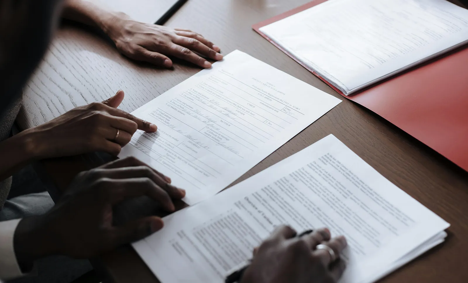 Two people recording an interview in a studio setting