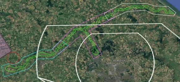 Satellite map showing flight path outlines and control zones over Norwich area, with colored routes and boundary circles.