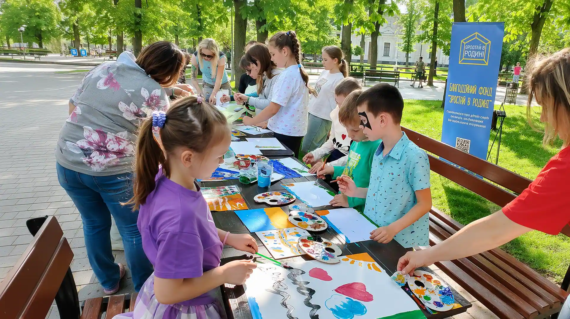 Children paint during a creative celebration organized by the “Growth in the Family” Foundation in Kremenchuk.