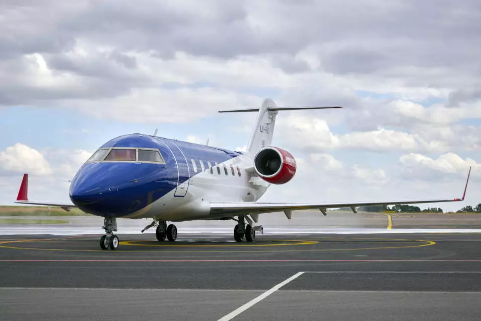 European Air Ambulance Challenger jet parked on an airport runway ready for a medical transport mission.