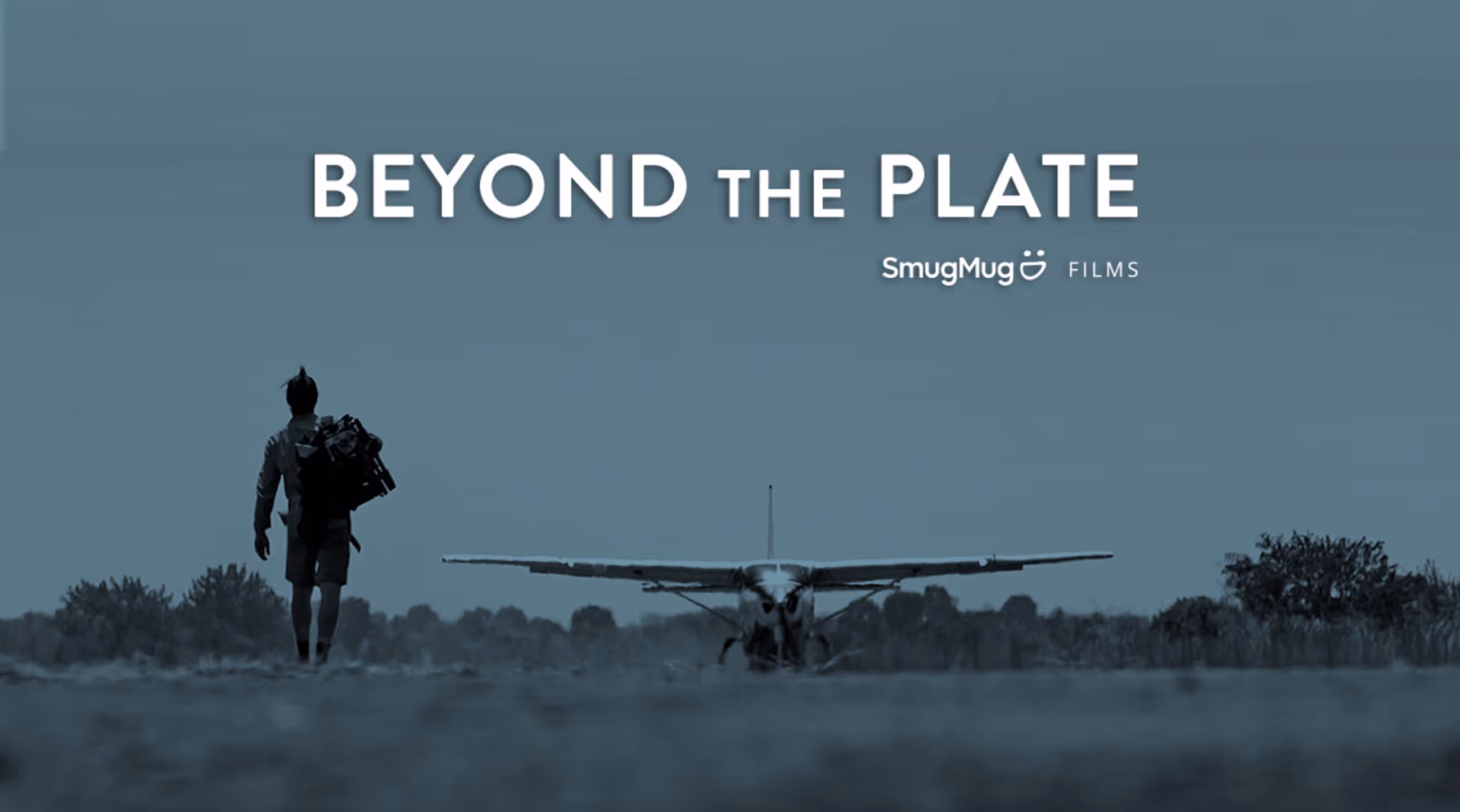 Silhouette of a person carrying gear walking towards a small airplane on a runway with text 'BEYOND THE PLATE' and SmugMug Films logo above.