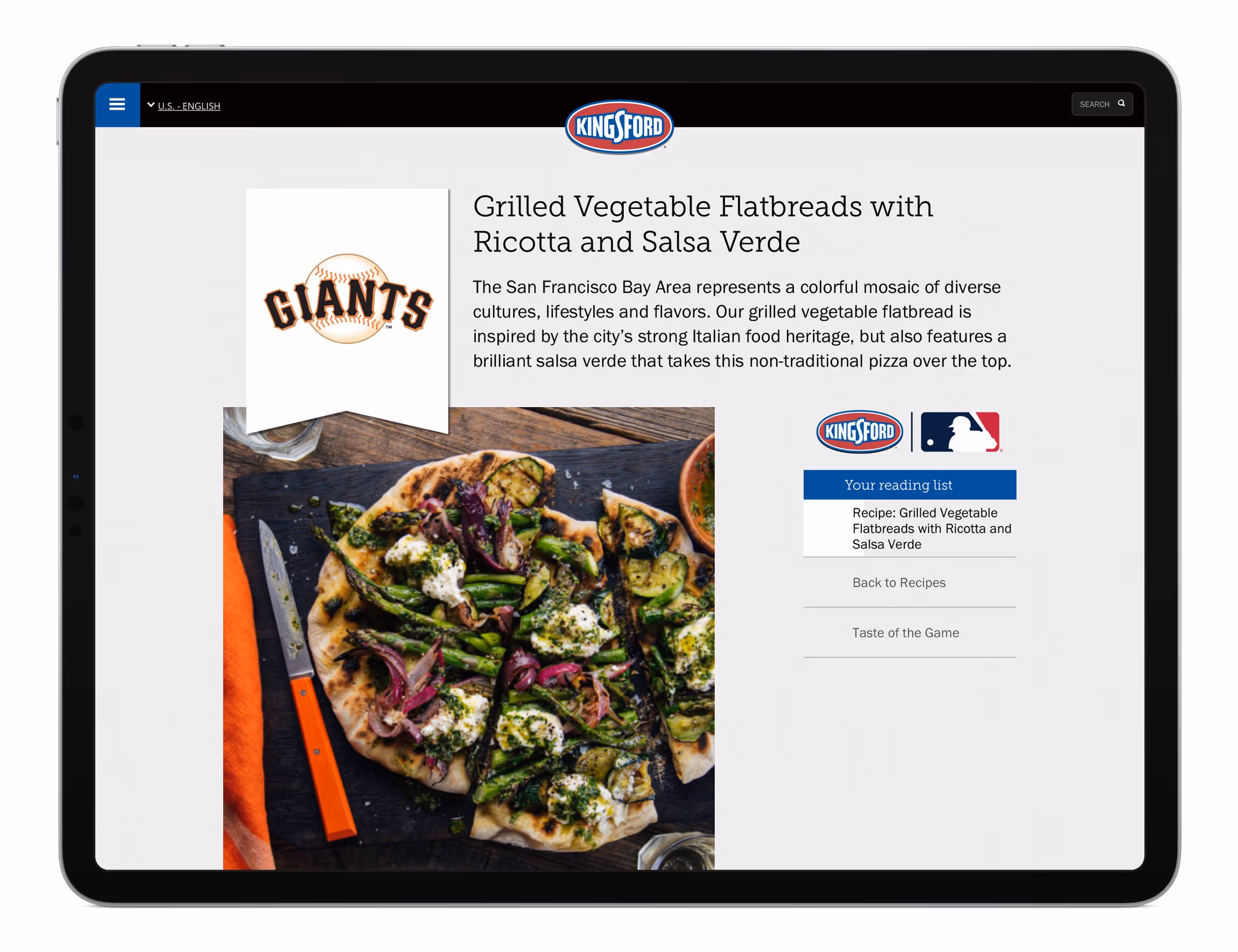 Tablet screen showing a Kingsford recipe page for Grilled Vegetable Flatbreads with Ricotta and Salsa Verde featuring a sliced flatbread pizza topped with grilled asparagus, red onions, ricotta, and green salsa verde sauce.
