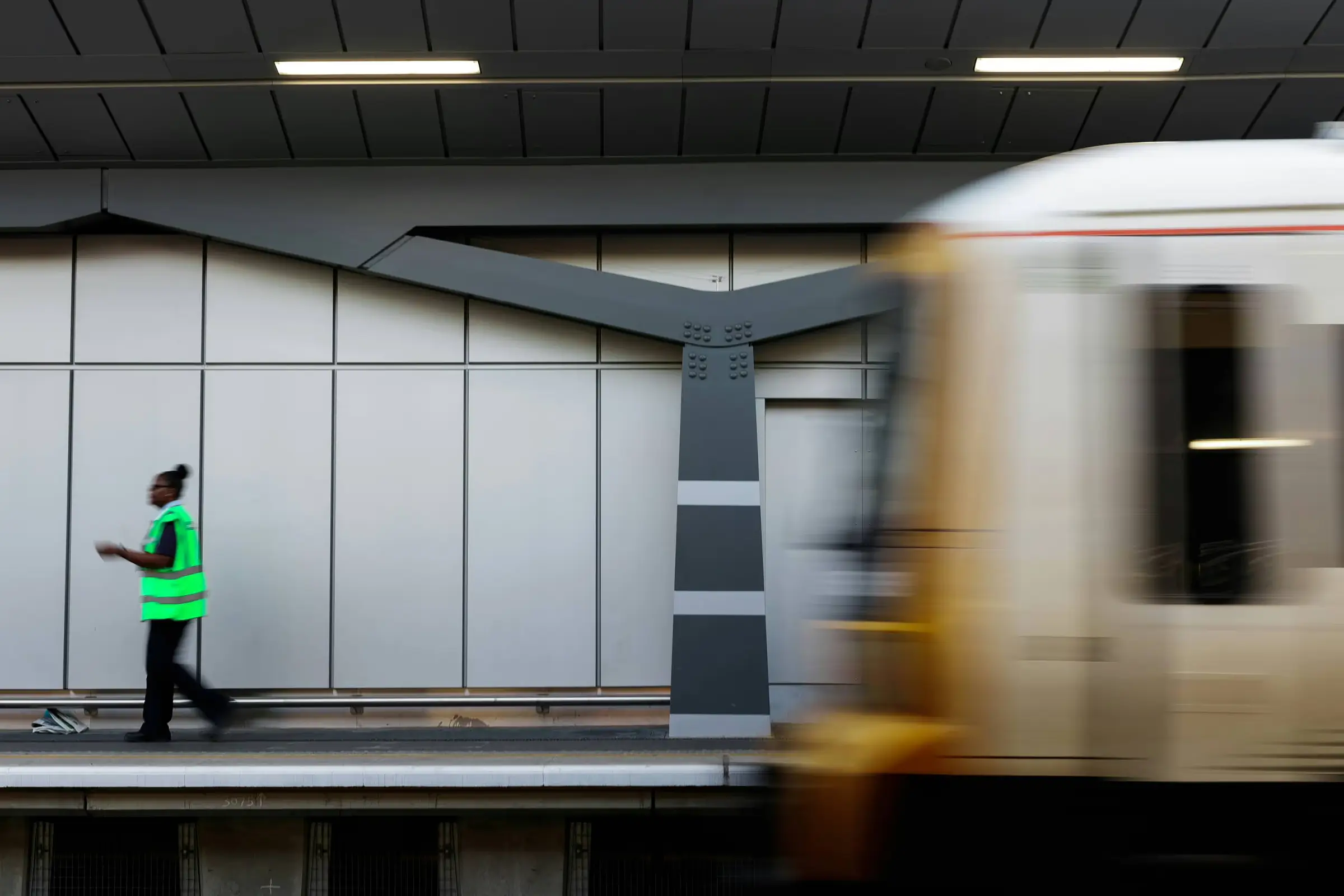 operator on platform at train station
