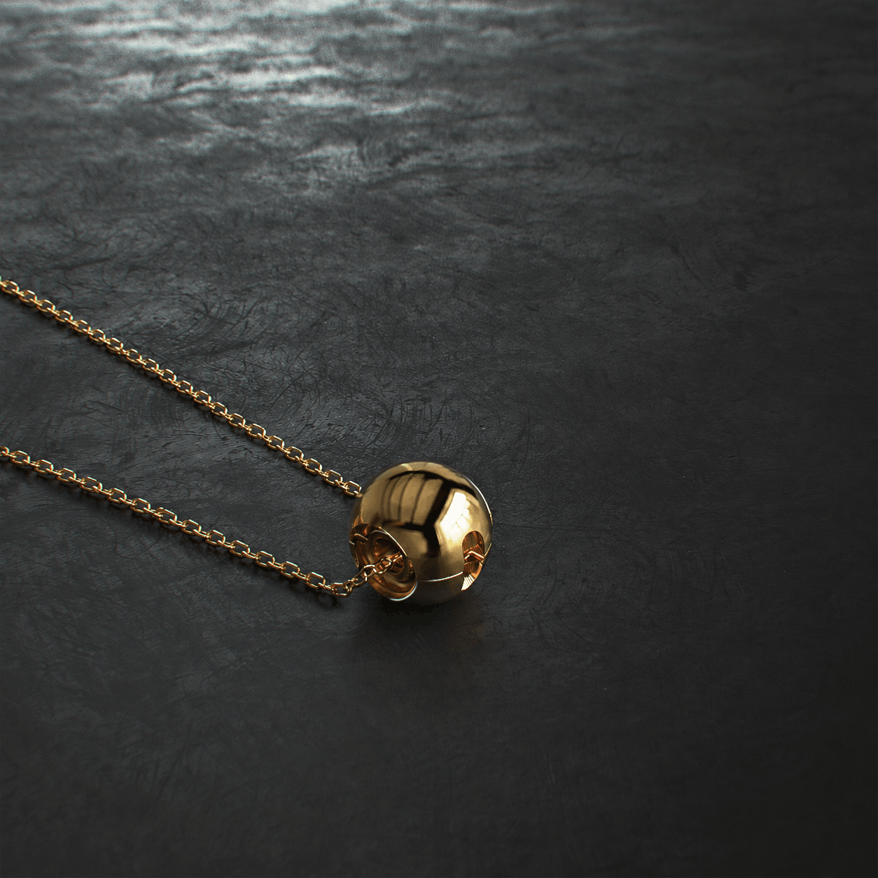 Layrium jewelry imperium pendant brass on floor