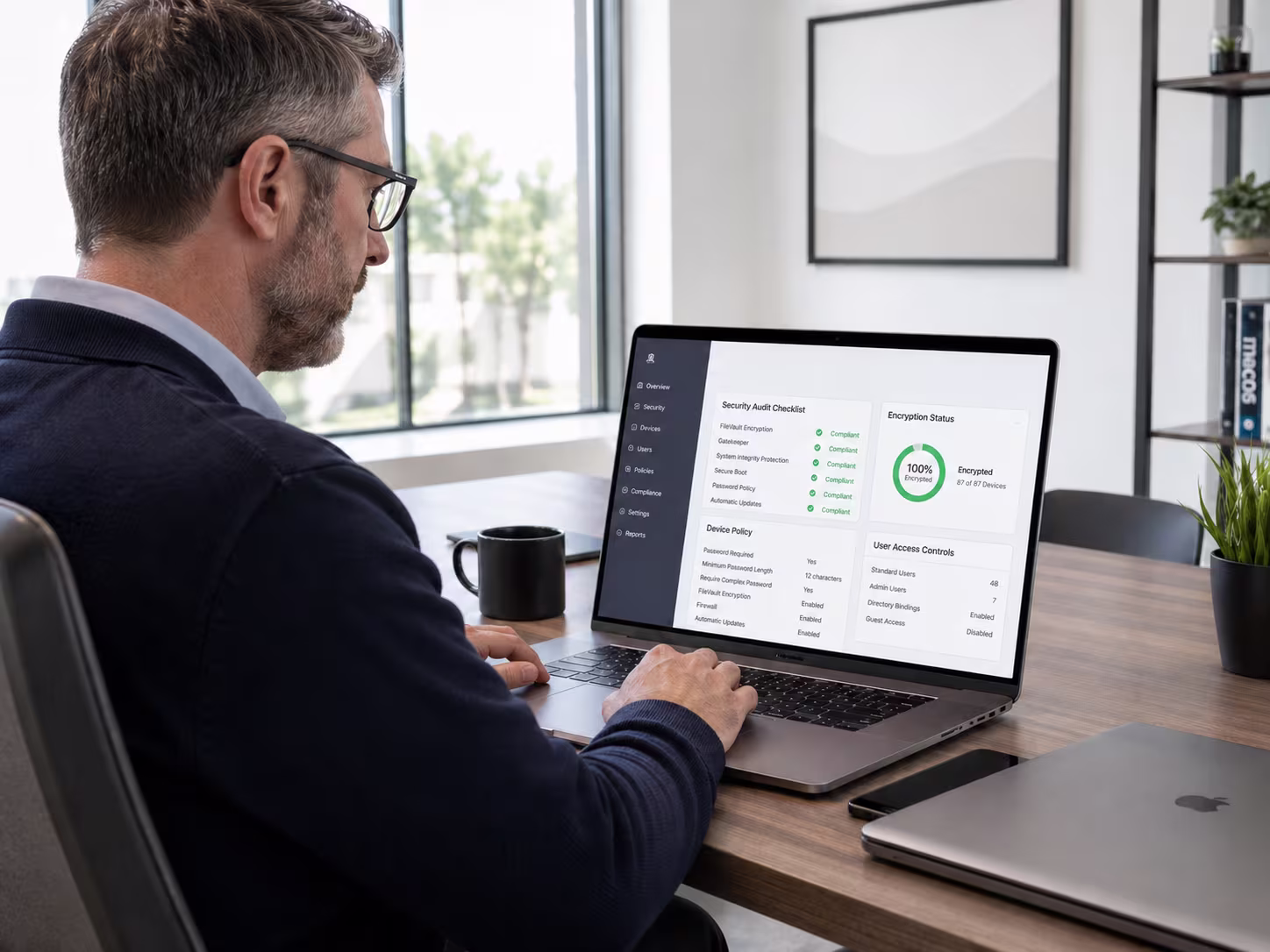 Middle-aged man handling Apple IT compliance services