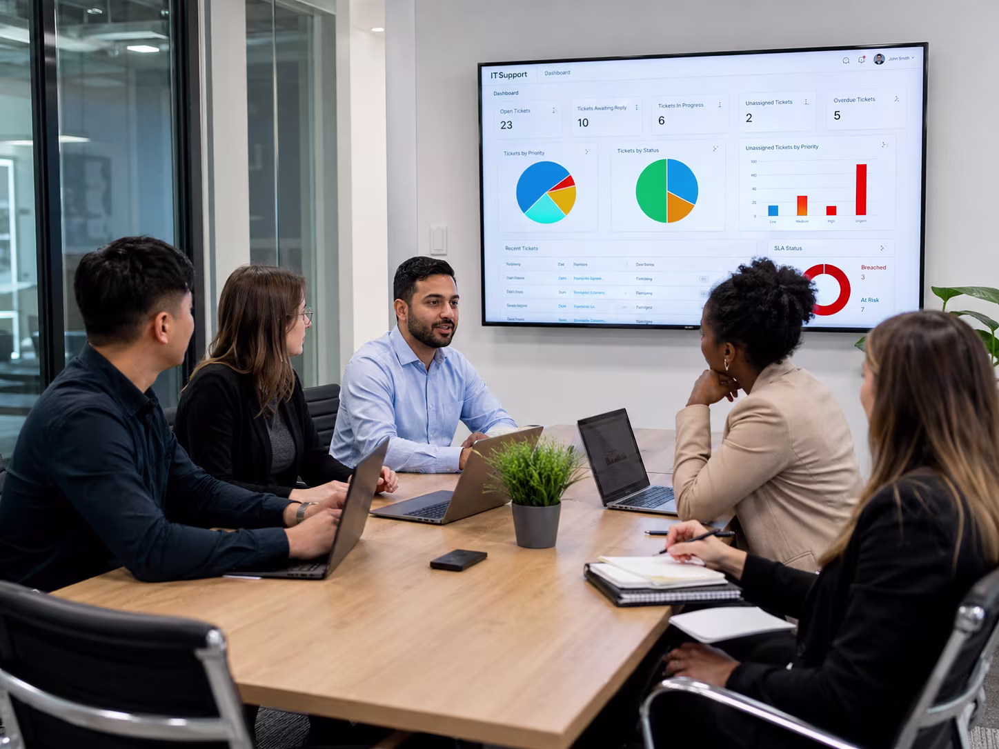 Diverse IT support company meeting
