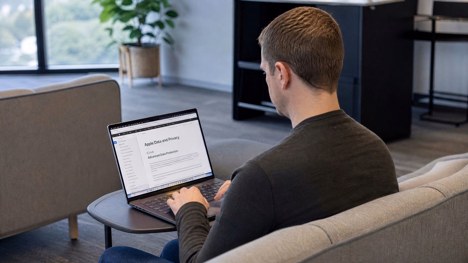 LOUNGE AREA LAPTOP An IT professional  one person working on a laptop in a ca