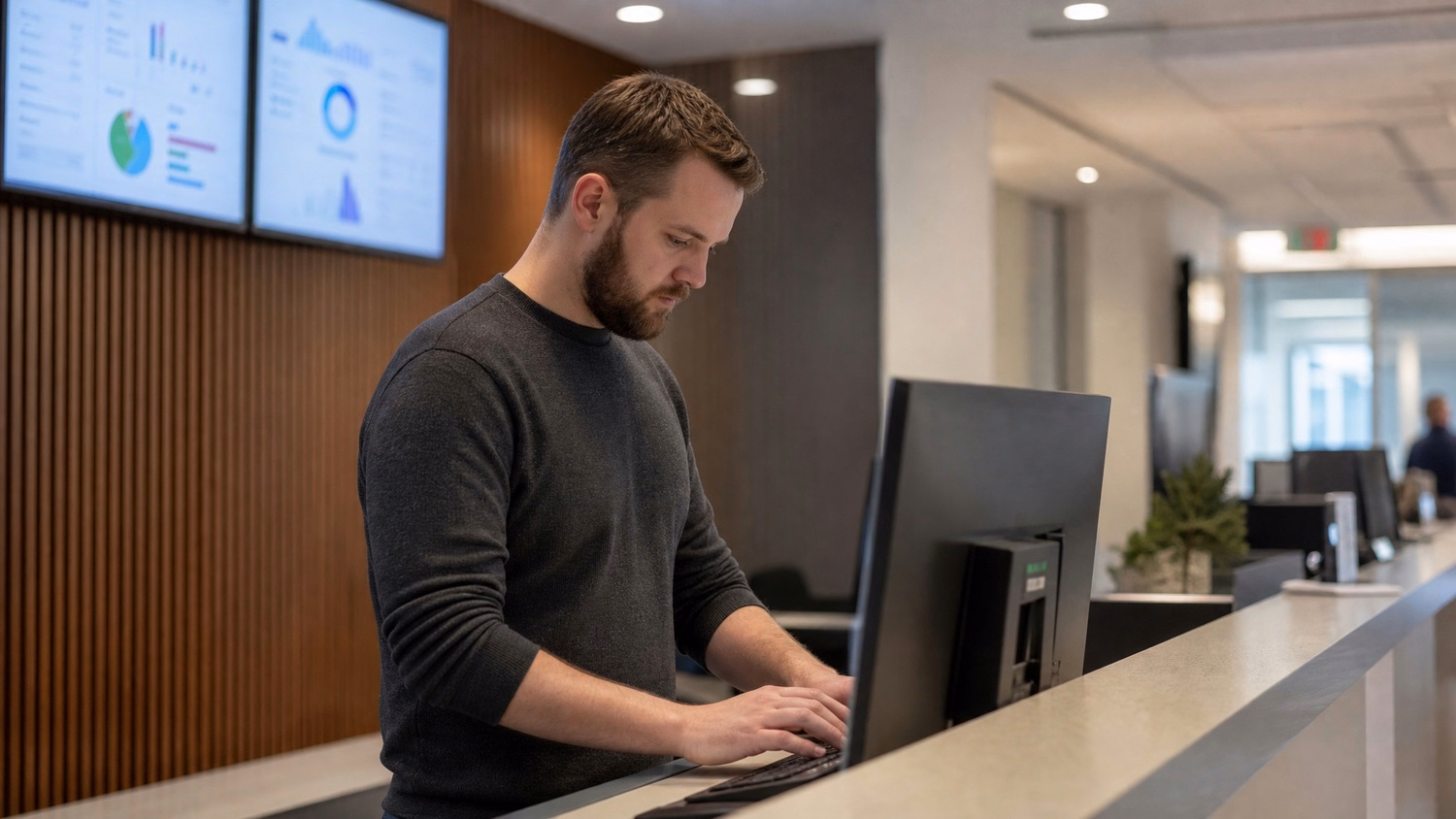 RECEPTION AREA An IT professional one person standing at a front reception d