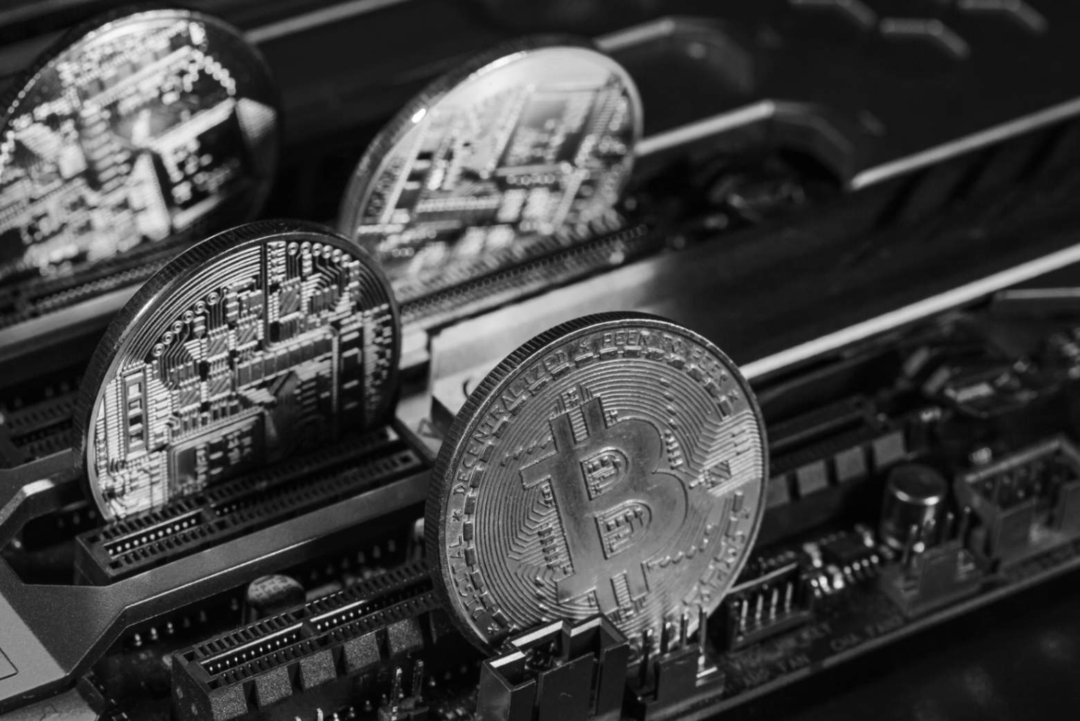 golden bitcoin and computer chip in background