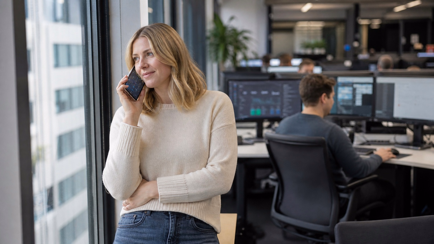 Woman on phone, viewing network diagram on screen 56 chars
