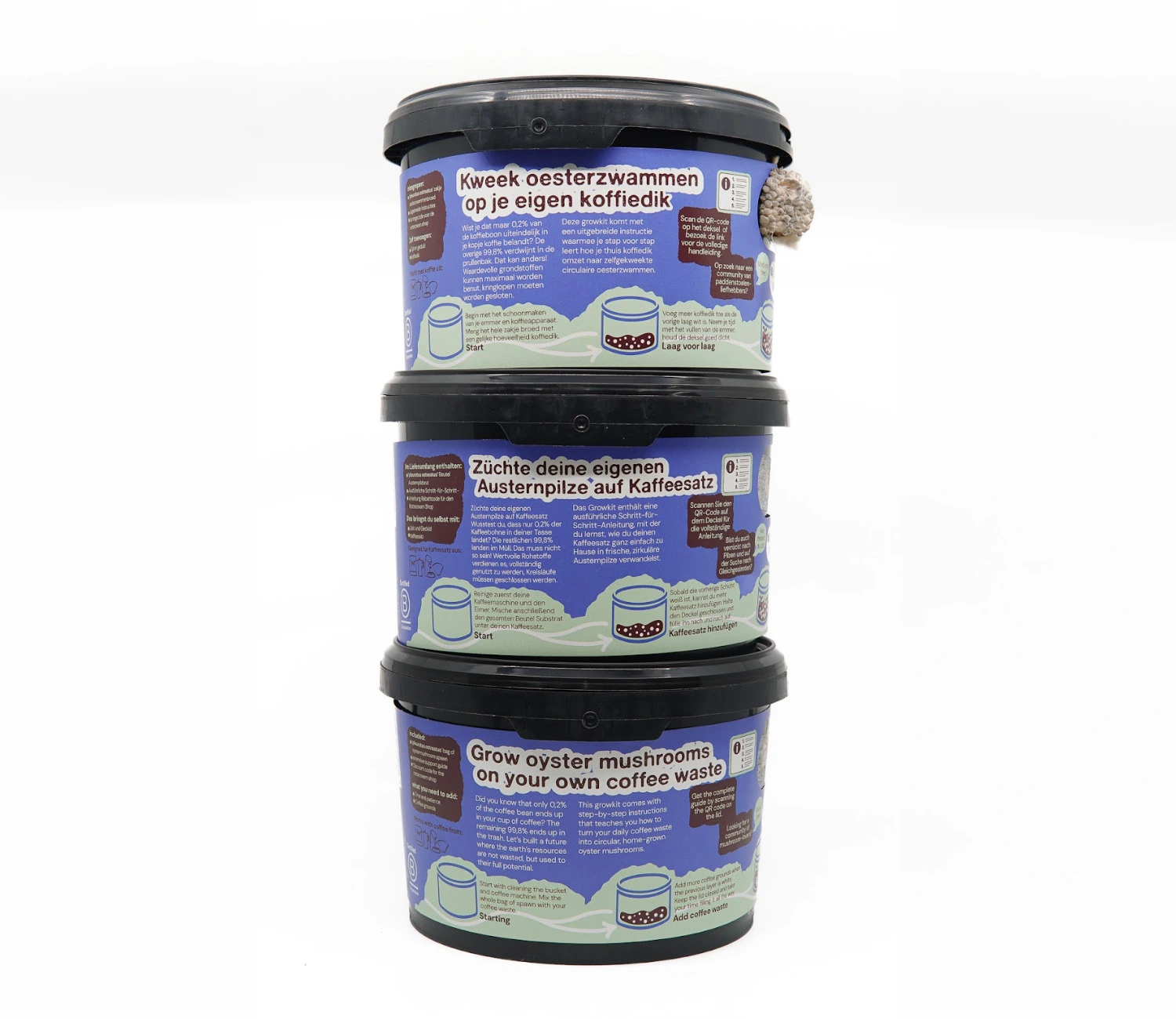 Stack of three growkits with instructions to grow oyster mushrooms using coffee waste in Dutch, German, and English.