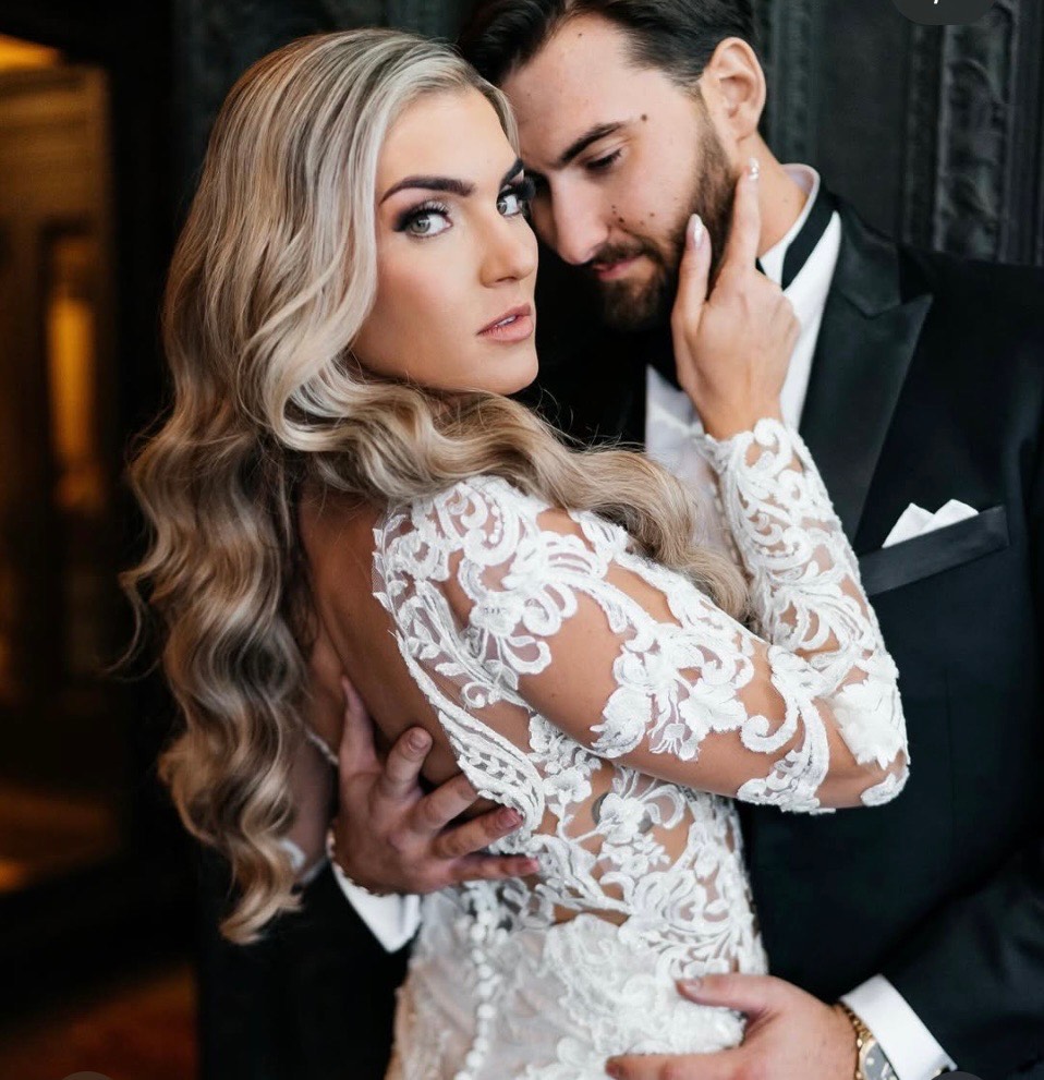 sexy bride with botox on her wedding day with groom