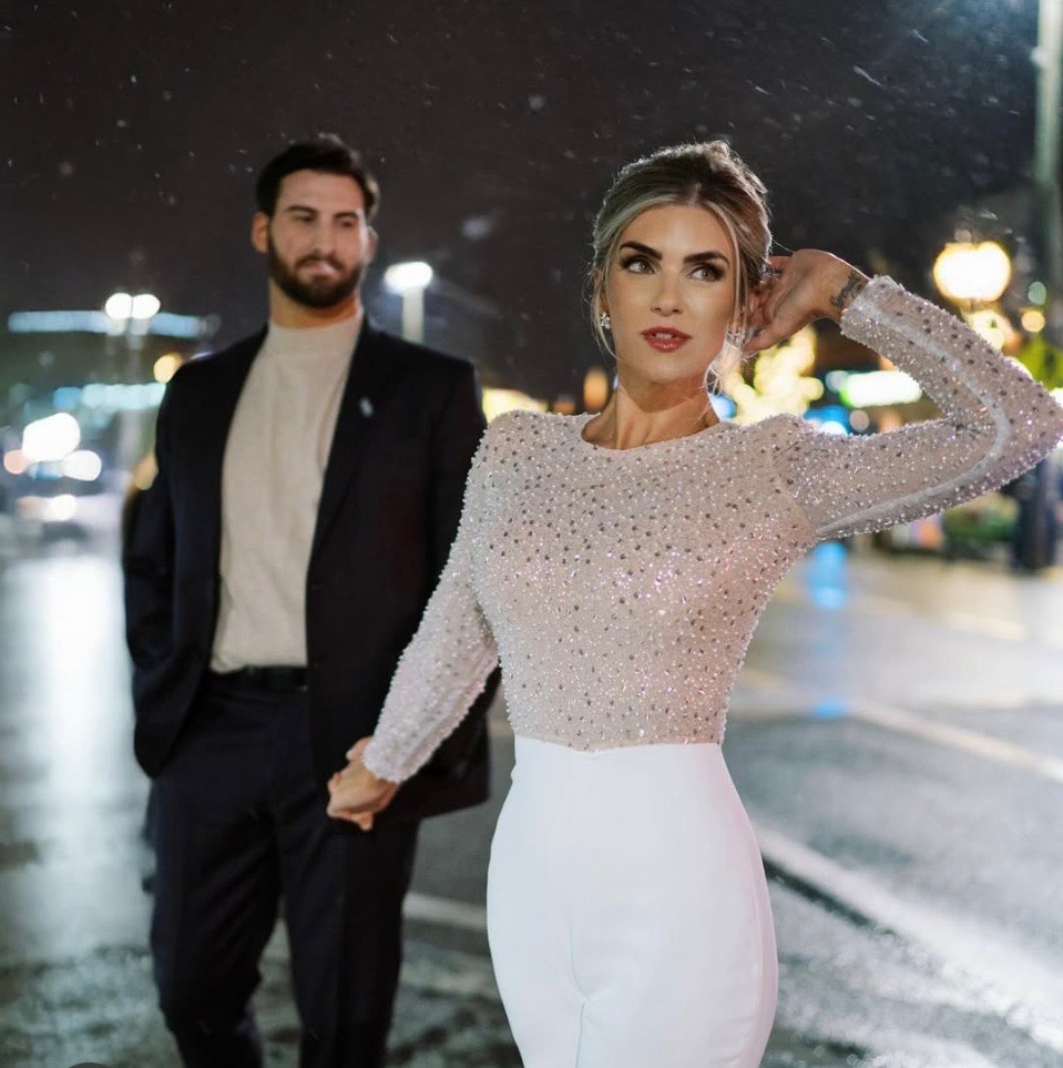 glamorous bride with botox on her wedding day with groom