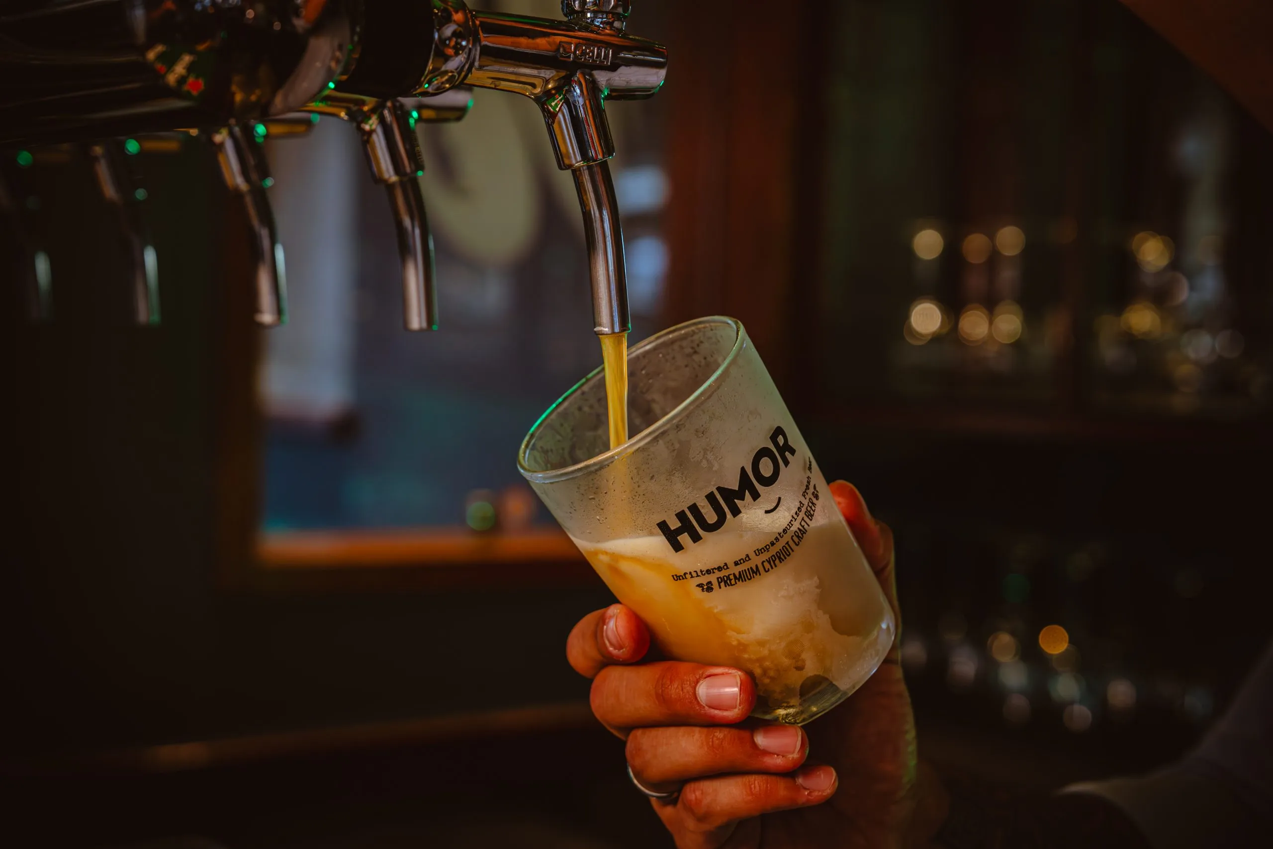 Skqutz logo with stylized tree and lettering.