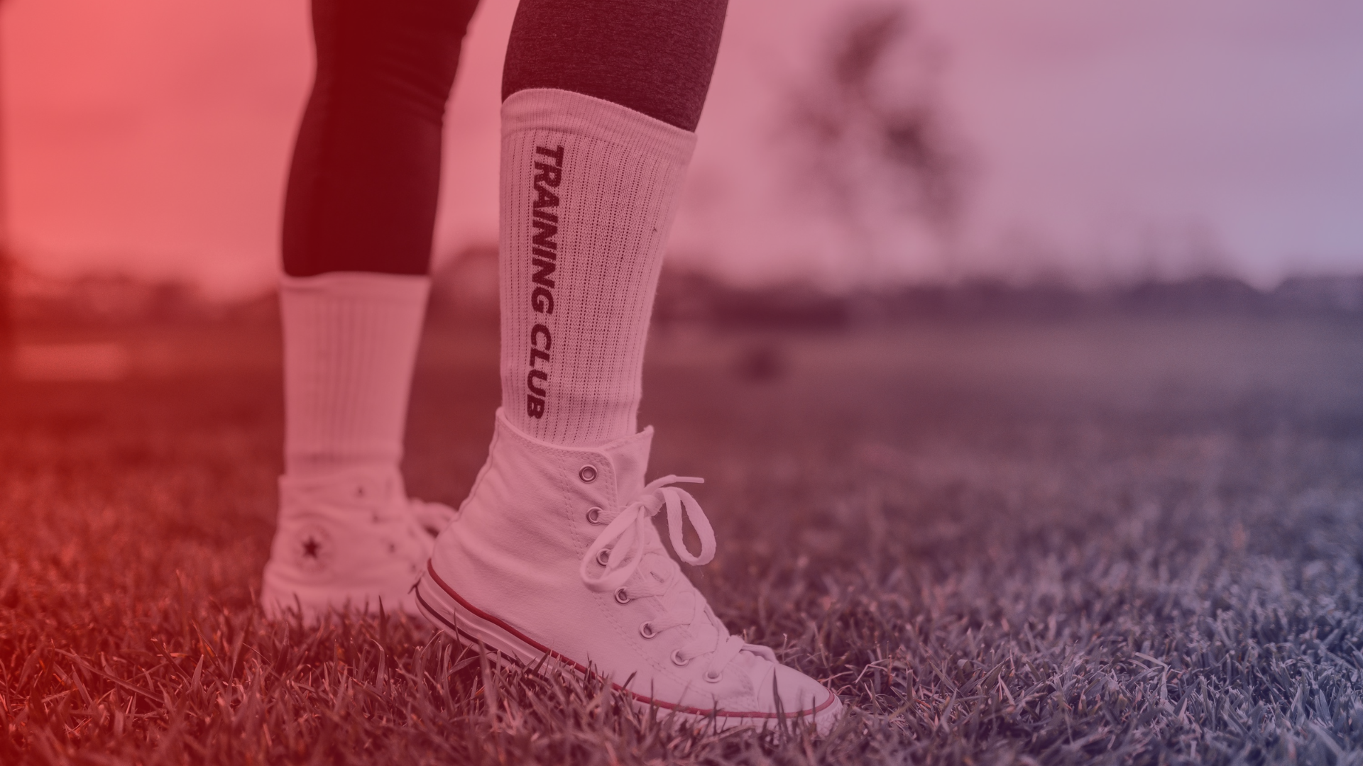 Photo of trainers & socks with the words training club