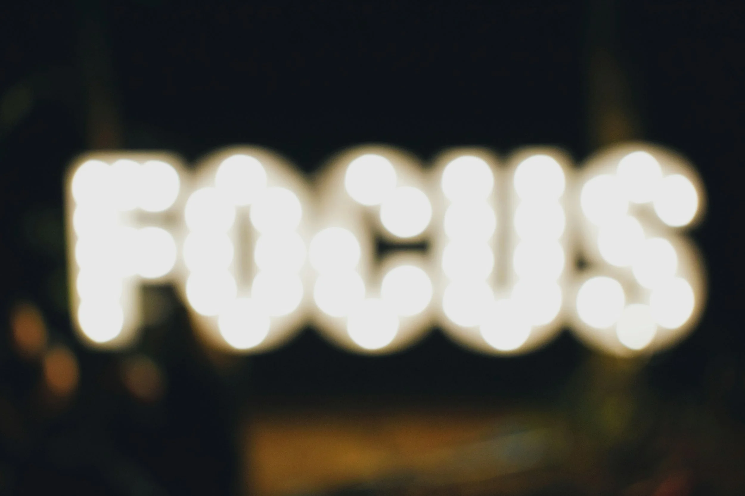 Blurred photo of the word focus 