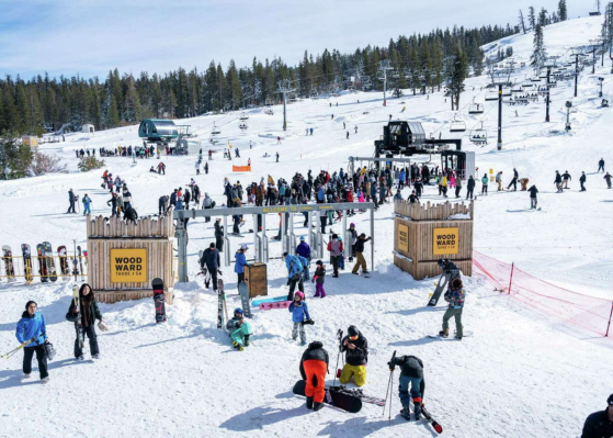 Crowds at a Lake Tahoe ski resort during peak winter season.