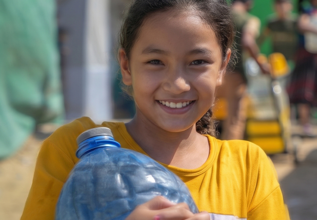 Single child portrait, close crop, direct eye contact