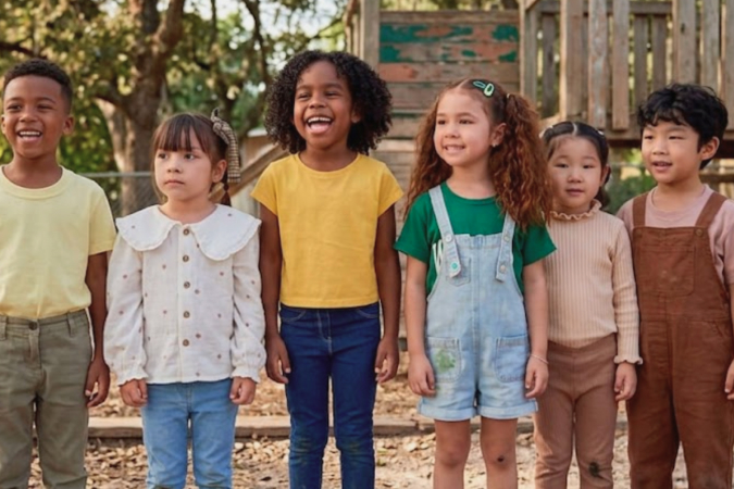 Group photo of kids at a playground
