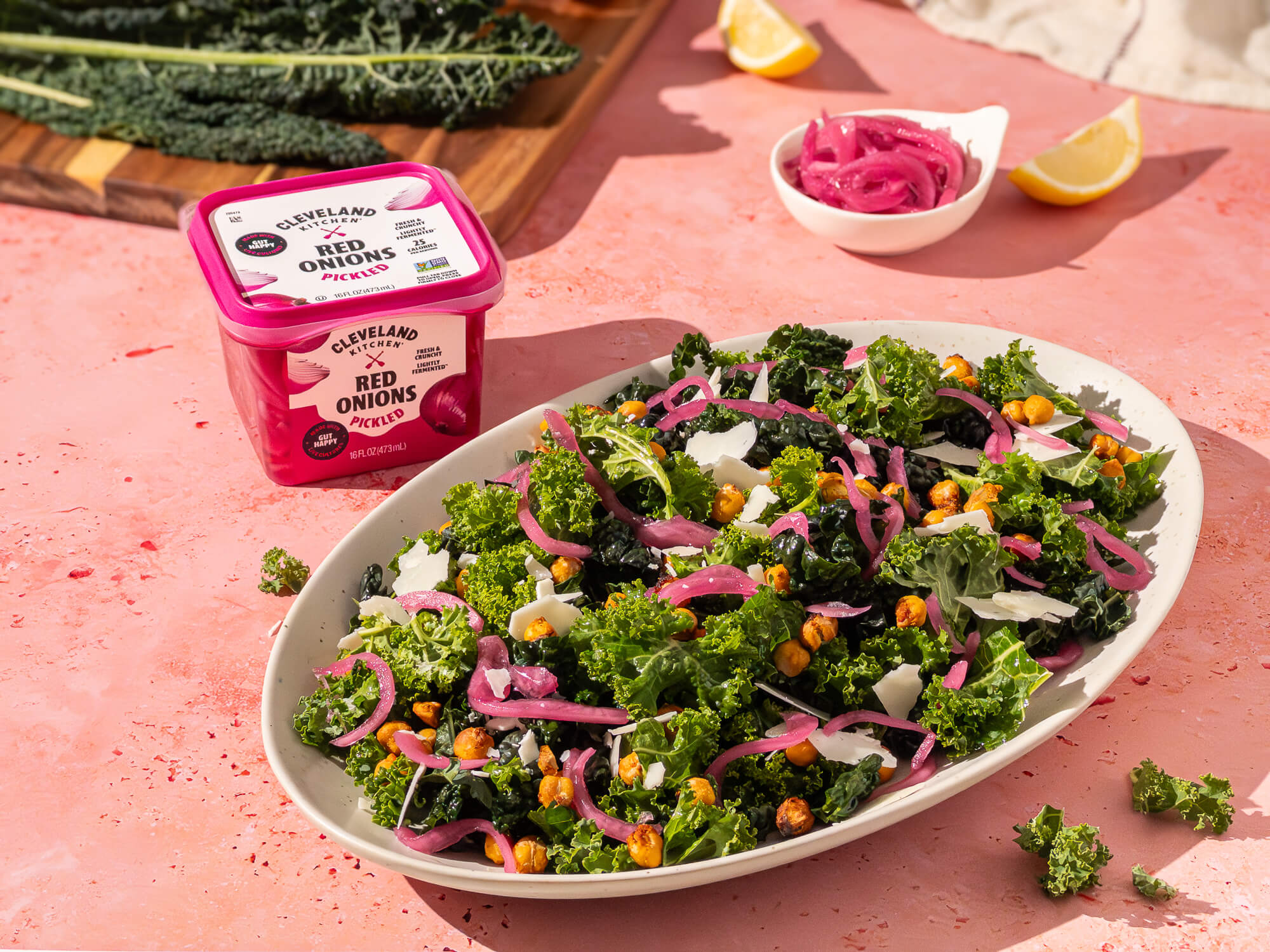 Bright and vibrant kale salad with crispy chickpeas and Cleveland Kitchen Pickled Red Onions.
