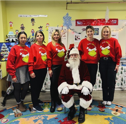 A picture of kindergarten teachers with Santa