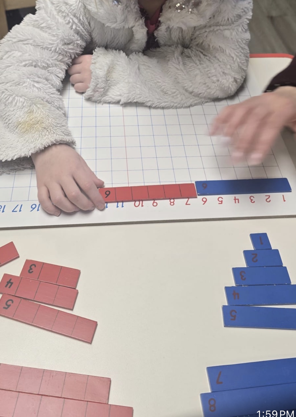 Kindergarten teacher teaching kids