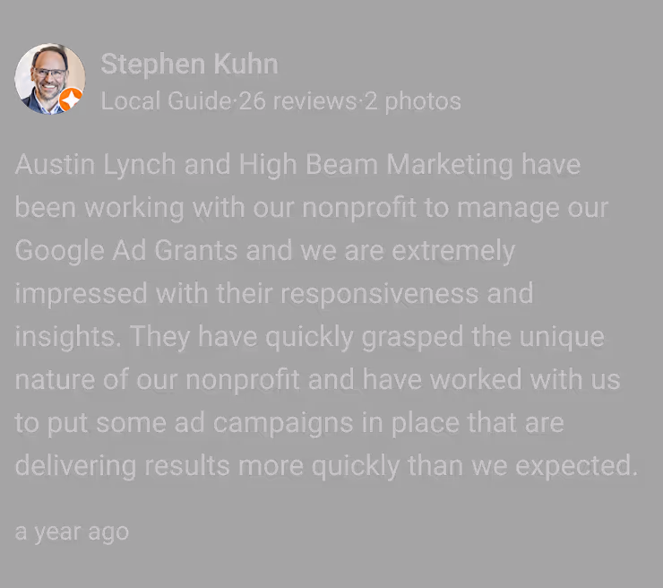 Google review by Stephen Kuhn praising Austin Lynch and High Beam Marketing for managing nonprofit's Google Ad Grants with responsive insights and quick results.