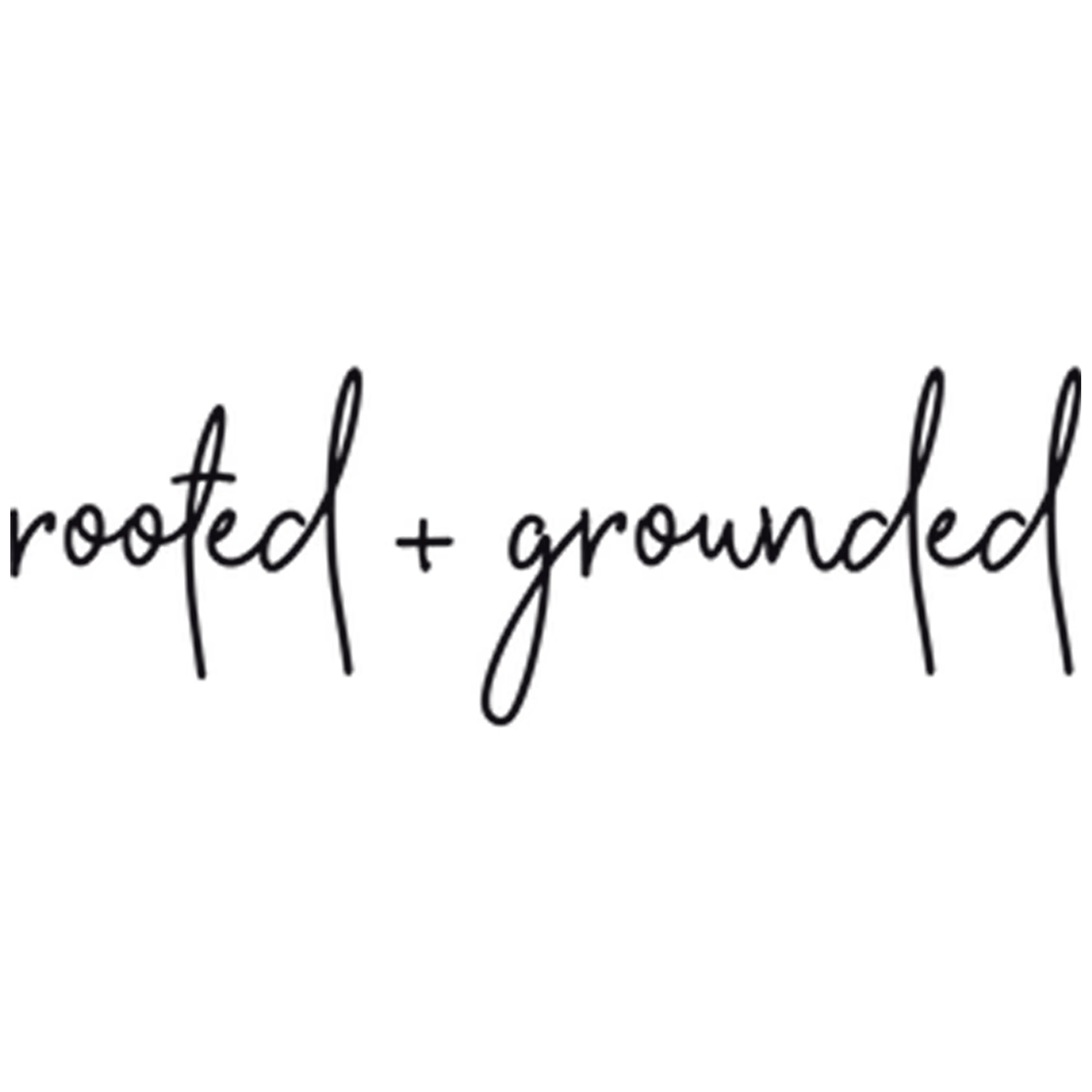 Handwritten text saying 'rooted + grounded' in black script on a transparent background.