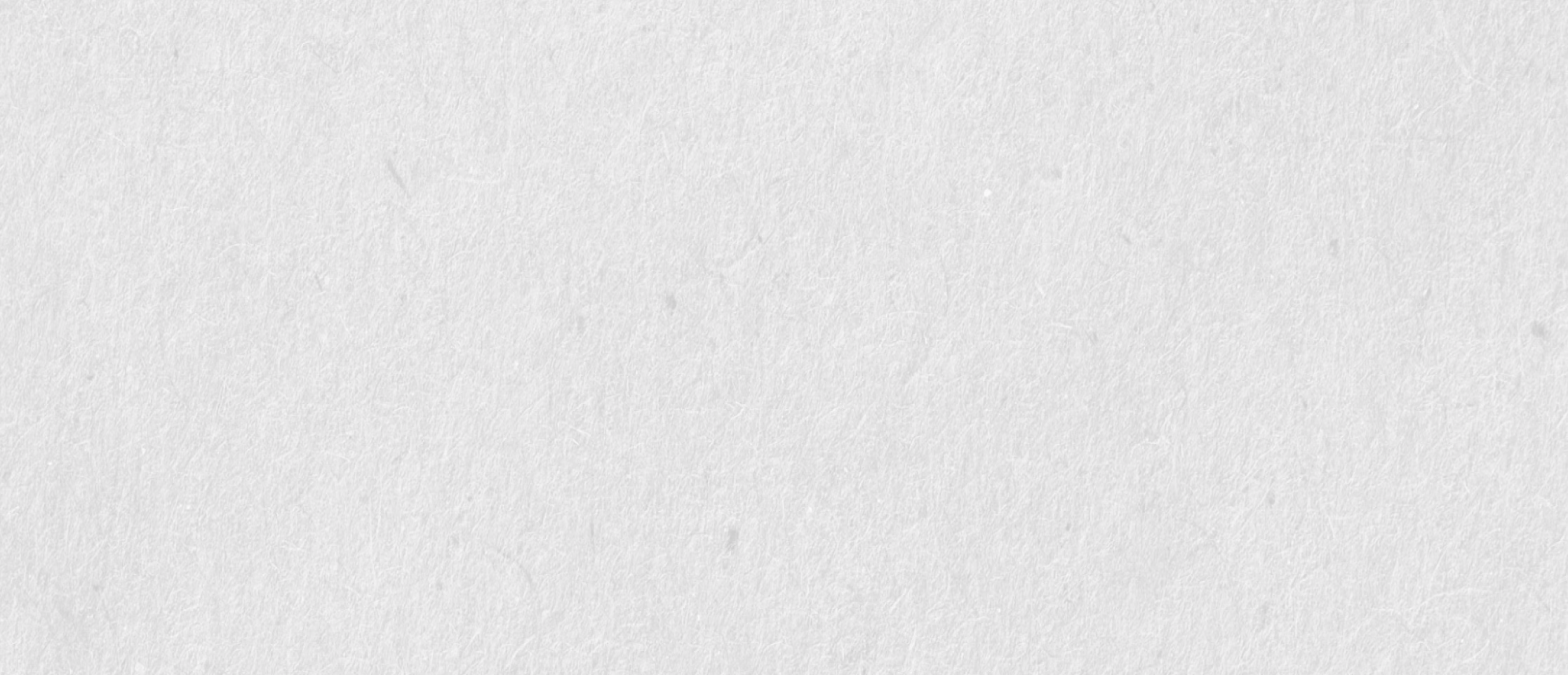Close-up texture of gray recycled paper with visible fiber strands and small dark flecks.